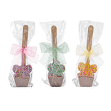 Chocolate drink stirrers with a Flower or Butterfly with Green, Pink & Yellow Ribbons. 55g 1 each
